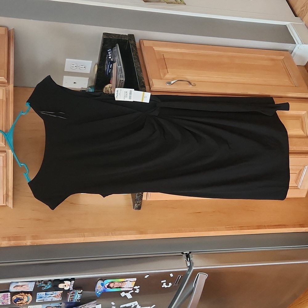 Cute black dress new w tags size 14.